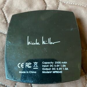 Nicole Miller battery pack compact with mirror